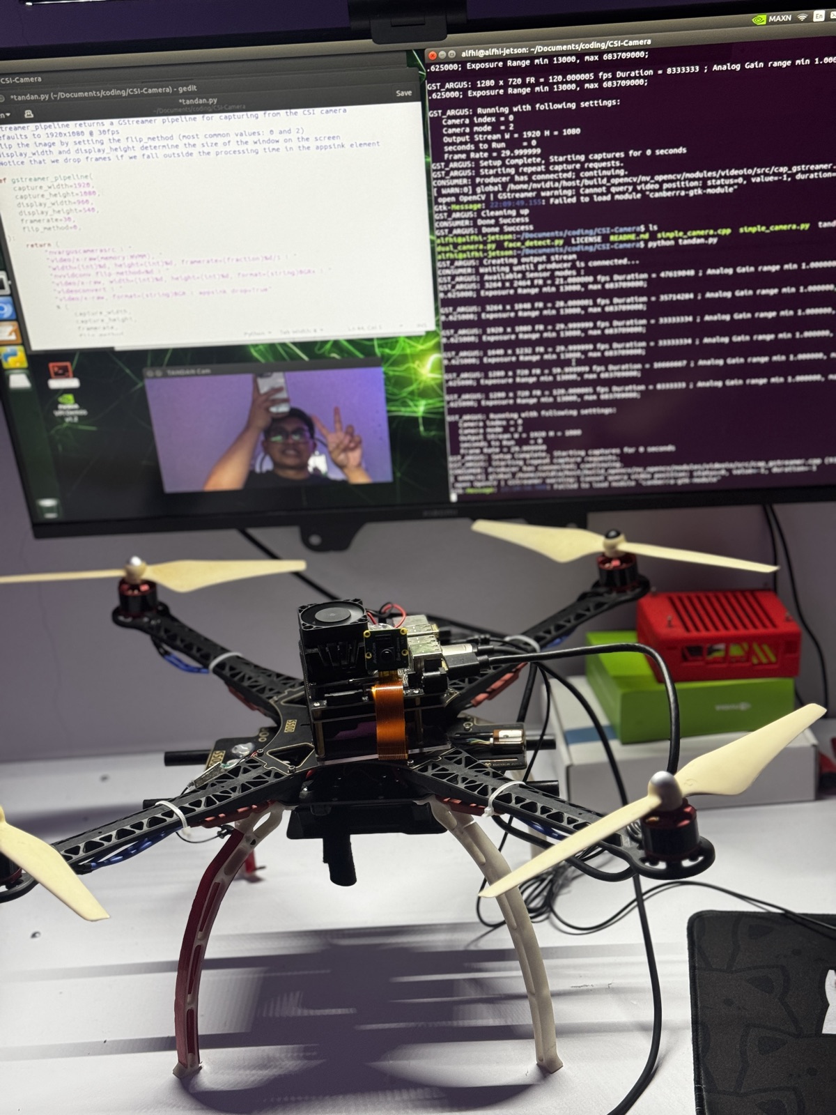 Jetson Nano and IMX219 camera mounted on the drone, with the camera feed on a bench monitor